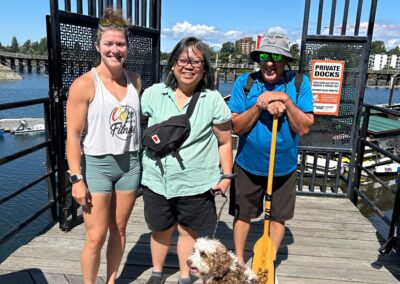Three VSRA supporters and their fluffy doggy companion, ready for the dragon boat adventure.