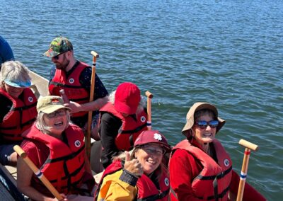 VSRA members and supporters give a thumbs up and smiles, ready for the dragon boat voyage