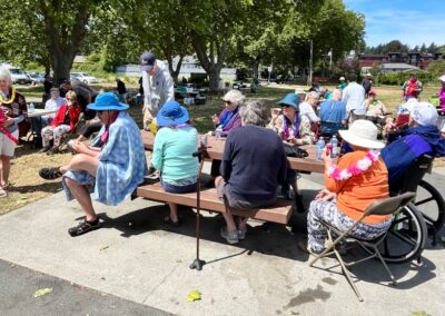 Group of VSRA members sitting at a picnic table.