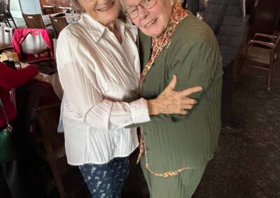 Two women hugging and smiling, VSRA members