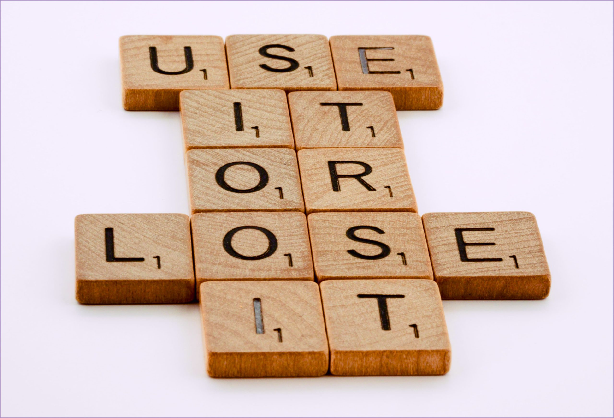 Scrabble pieces laid out to say "Use it or lose it."